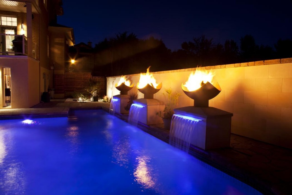 swimming pool fountain with lights